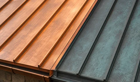 Copper and zinc roofing panels with a premium patina finish